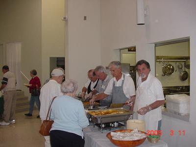 Brother Knights serving the dinner